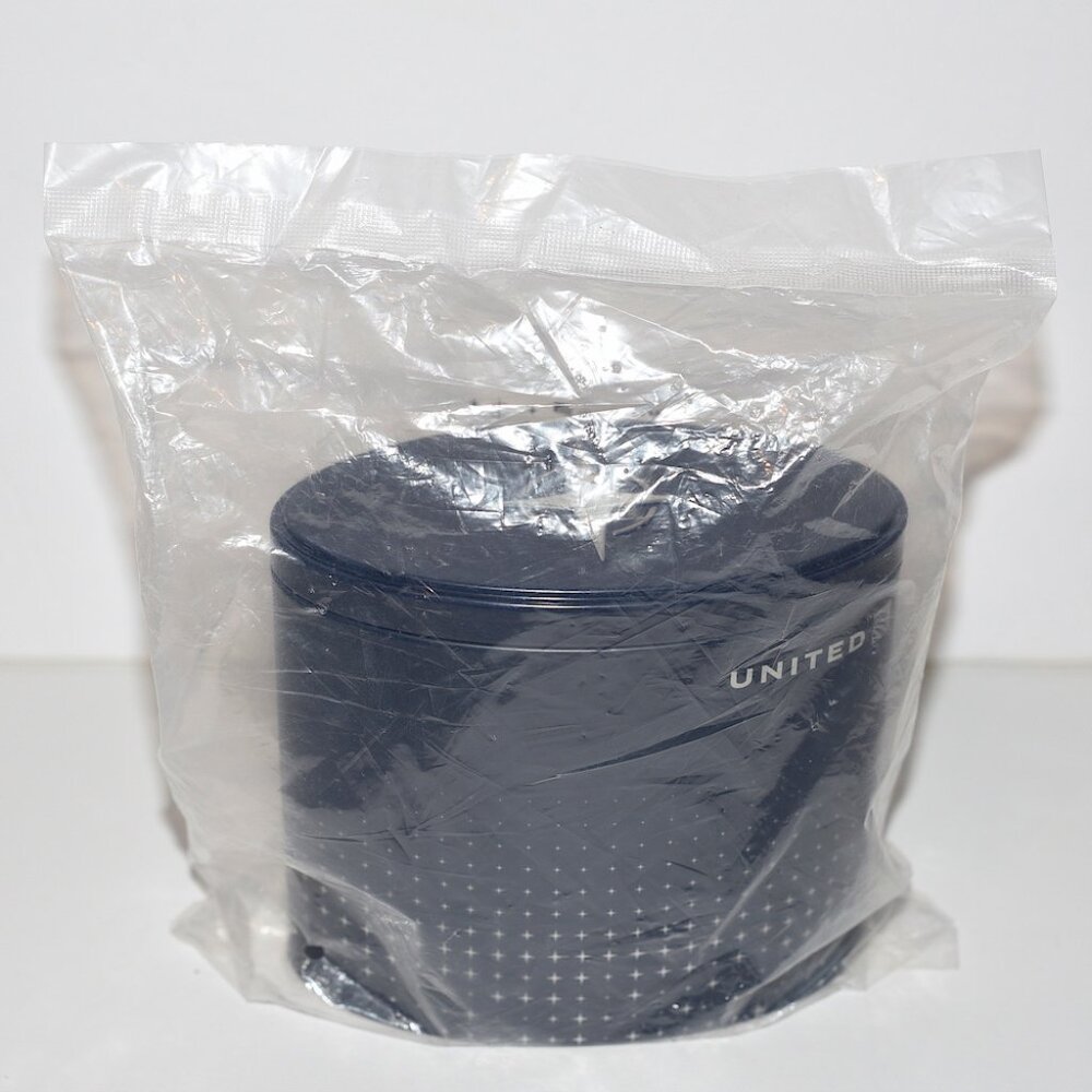 New (Sealed) United Airlines Polaris BusinessFirst + Cowshed Amenities Kit Tin